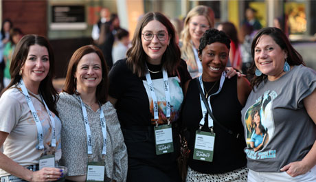 A group photo of smiling event attendees